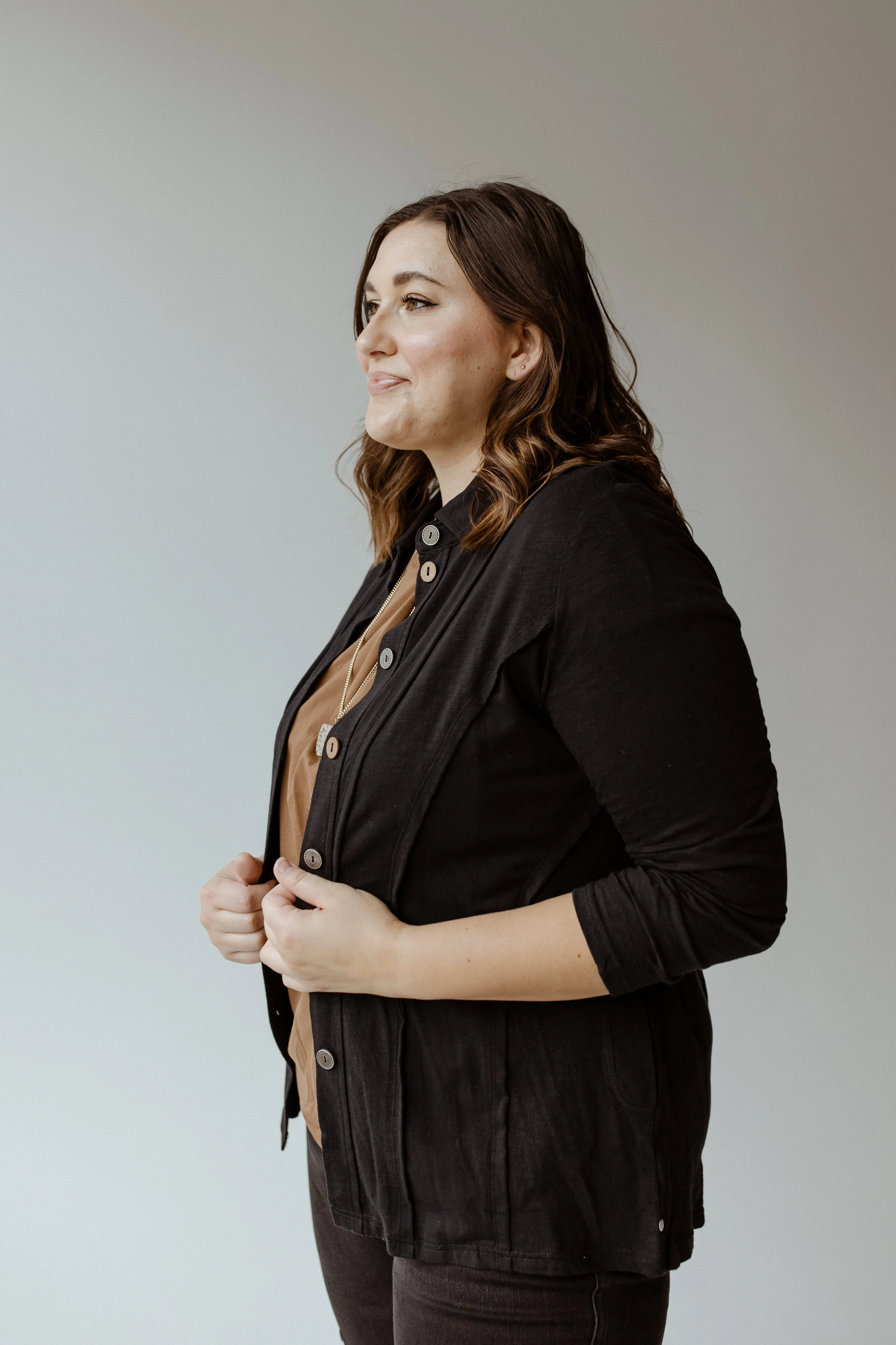 BUTTON-UP BLOUSE WITH RAW SEAM DETAILS IN BLACK