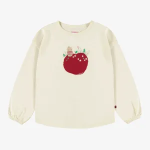 T-shirt crème manches longues avec une pomme rouge en jersey extensible, enfant || Cream t-shirt with long sleeves and red apple print in stretch jersey, child